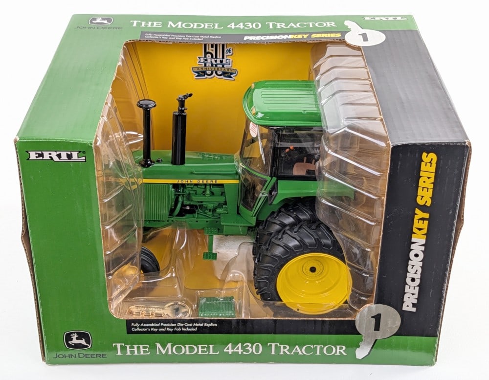 1/16 Ertl John Deere 4430 Tractor Precision Key Series #1: 1/16 Ertl John Deere 4430 tractor with duals and cab. Precision key series #1. Good condition new in the box and highly detailed.
