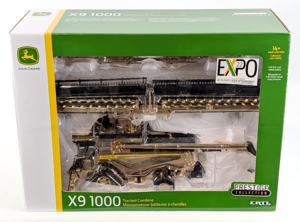 1/32 Ertl John Deere X9 1000 Combine With Tracks - Gold Expo Award: 1/32 Ertl John Deere X9 1000 combine with tracks, folding corn head, and draper head. The combine is a special gold plated Expo award. Good condition new in the box. A very nice hard to find gold plat
