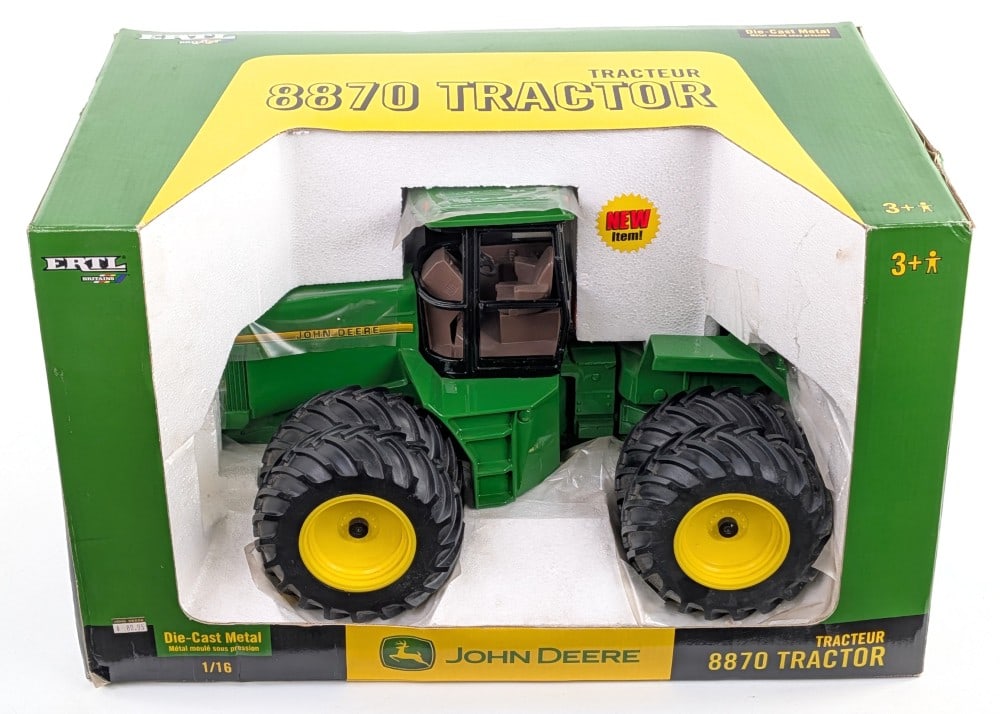 1/16 Ertl John Deere 8870 4wd Tractor: 1/16 Ertl John Deere 8870 4wd tractor. The tractor is new in the box with some dust and light wear from storage. This one tends to be one of the harder Ertl 4wd John Deere tractors to find.