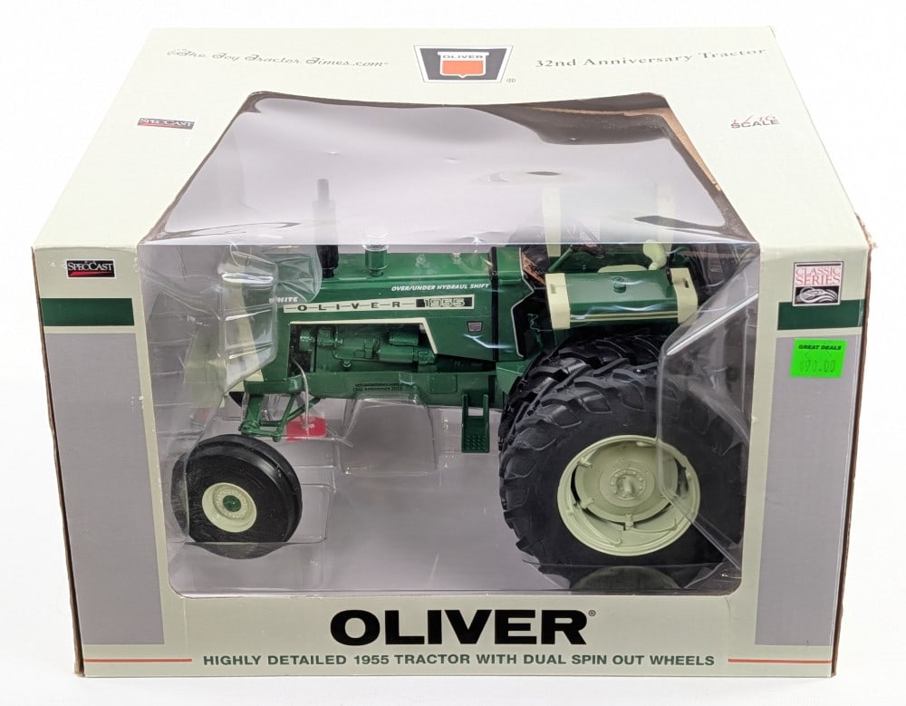 1/16 SpecCast Oliver 1955 Tractor with Dual Spin Out Wheels: 1/16 SpecCast Oliver 1955 tractor with dual spin out wheels. 32nd Anniversary of The Toy Tractor Times edition. Good condition new in the box and highly detailed. The box shows light wear from handlin