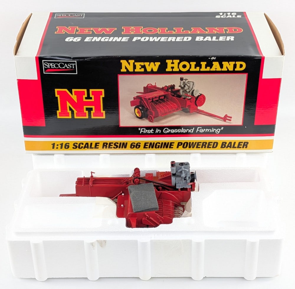 1/16 SpecCast New Holland 66 Engine Powered Baler: 1/16 SpecCast New Holland 66 engine powered baler. The baler is in good condition new in the box and highly detailed.