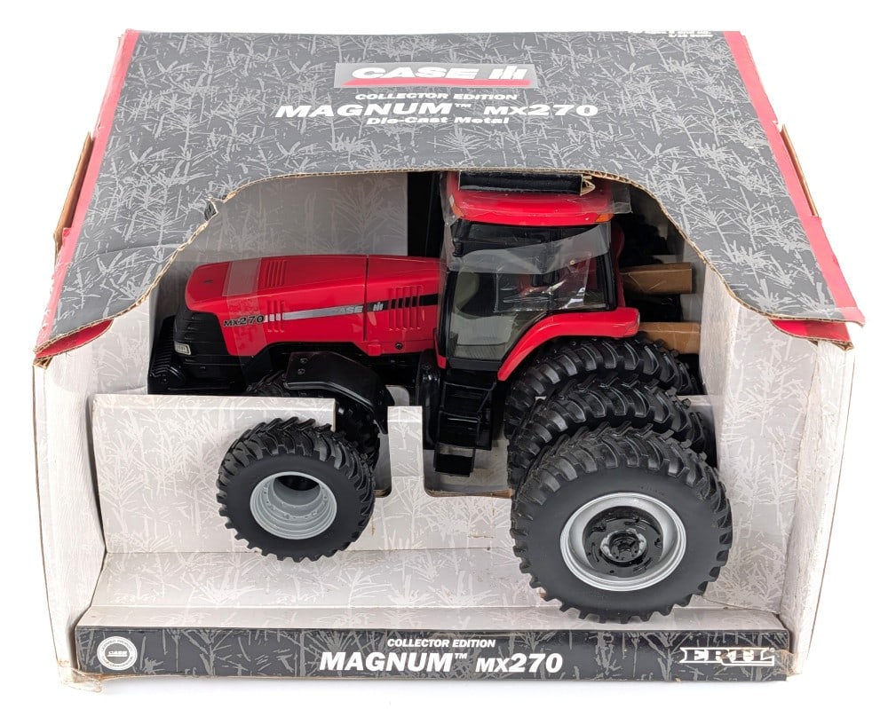 1/16 Ertl Case IH Magnum MX270 Tractor w/ Triples: 1/16 Ertl Case IH Magnum MX270 tractor with triples on the rear and duals on the front. Good condition new in the box. Collector's Edition.