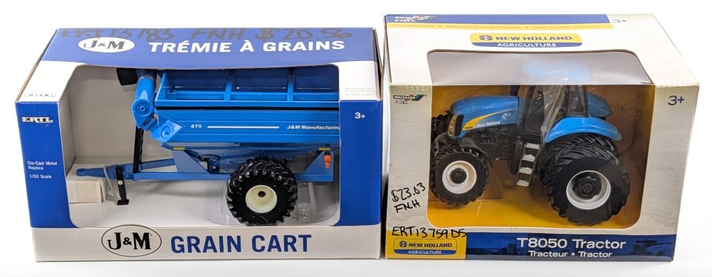 1/32 Ertl New Holland T8050 Tractor and J&M 875 Grain Cart: 1/32 Ertl New Holland T8050 tractor with duals and J&M 875 Grain cart. Good condition in the boxes. The tractor box has writing on it.