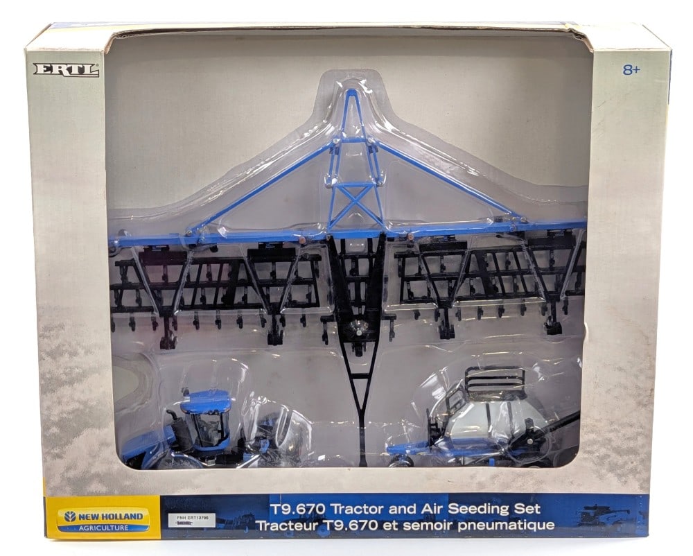 1/64 Ertl New Holland T9.670 Tractor and Air Seeding Set: 1/64 Ertl New Holland T9.670 Tractor and Air Seeding Set. Good condition new in the box and hard to find. The box has light wear from storage.