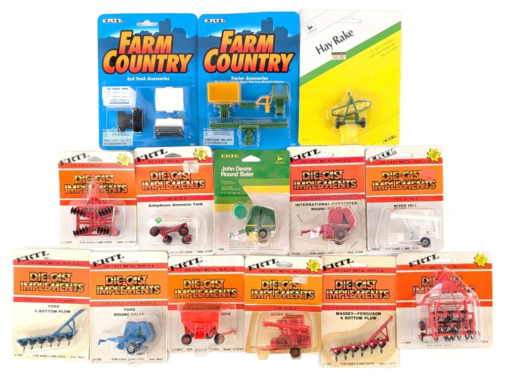 (14) 1/64 Ertl Farm Implements & Accessories: (14) 1/64 Ertl Farm Implements & Accessories. Includes disk, plows, mixer mills, round balers, anhydrous ammonia tank, truck accessories, tractor accessories, gravity wagon, and hay rake. The packages