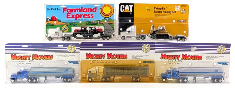 (5) 1/64 Ertl Semi Trucks w/ Trailers: Includes 1/64 Ertl Mack COE cab with livestock trailer, Caterpillar tractor hauling set, (2) Ford LTL 9000 trucks with tankers, and Case IH tractor hauling set. Good condition in the packages.