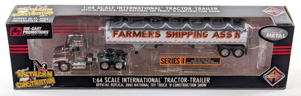 1/64 DCP International Semi Truck w/ Farmers Shipping Ass'n Grain Trailer: 1/64 Scale Die-Cast Promotions (DCP) International tractor with Farmers Shipping Ass'n grain trailer. Good condition new in the box and highly detailed. 2003 National Toy Truck 'N Construction Show Ed