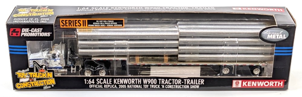 1/64 DCP Kenworth W900 Truck with Stepdeck Trailer Loaded w/ Corrugated Pipe: 1/64 Scale Die-Cast Promotions (DCP) Kenworth W900 truck with corrugated pipe loaded stepdeck trailer. Good condition new in the box and highly detailed. 2005 National Toy Truck 'N Construction Show E