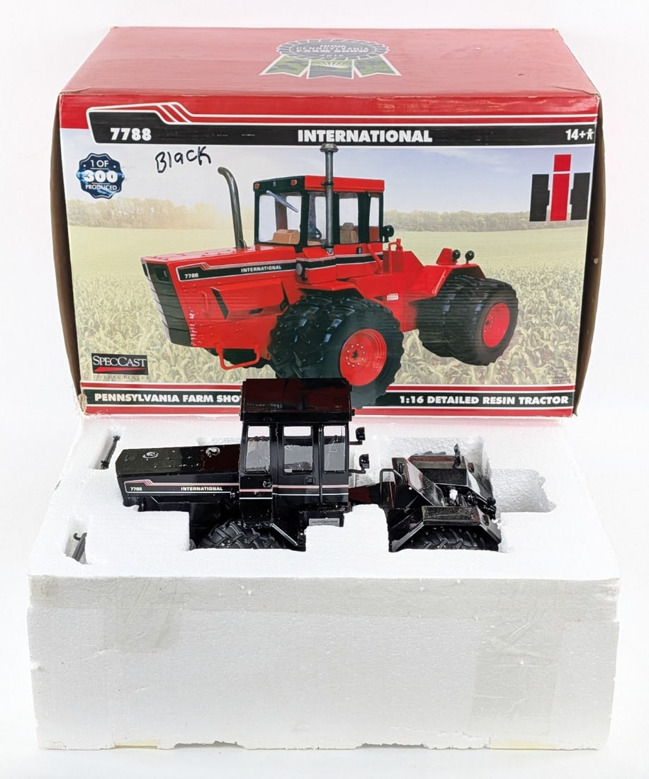 1/16 SpecCast International 7788 4wd Tractor (Black) Pennsylvania Farm Show: 1/16 Scale SpecCast International 7788 4wd tractor in all black. Limited edition #3 of only 12 produced! The tractor has a broken exhaust stack, air cleaner, and SMV sign. It is missing one of the rea