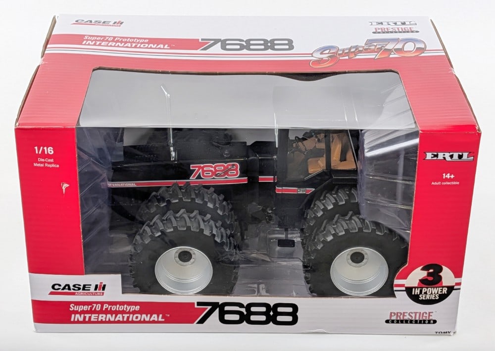 1/16 Ertl International 7688 Super 70 Prototype Tractor - Black: 1/16 Ertl International 7688 Super 70 Prototype tractor black chase unit. The tractor is in good condition new in the box. Prestige collection series. The box shows minor wear from storage.