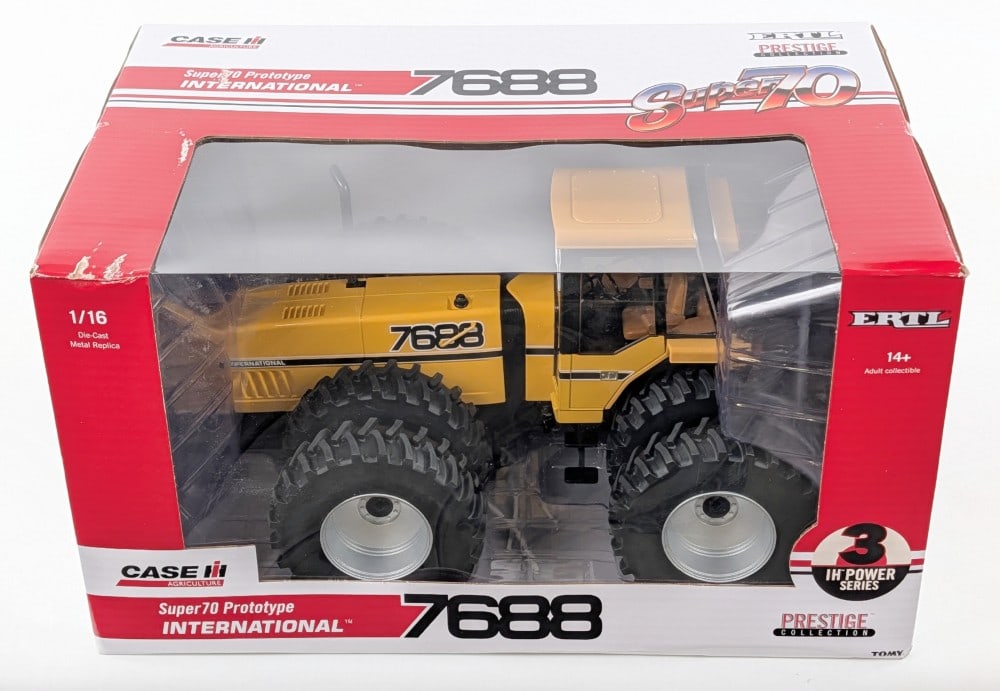 1/16 Ertl International 7688 Super 70 Prototype Tractor - Industrial Yellow: 1/16 Ertl International 7688 Super 70 Prototype tractor industrial yellow. The tractor is in good condition new in the box. Prestige collection series. The box shows light wear from storage / handling