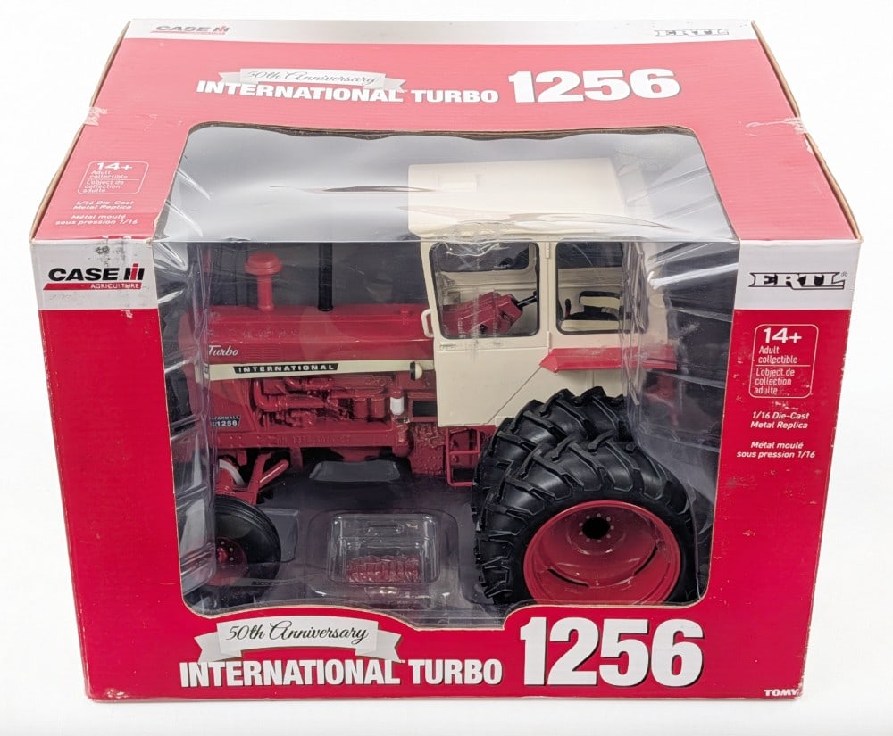 1/16 Ertl International Turbo 1256 Tractor w/ Duals & Cab: 1/16 Ertl International Turbo 1256 tractor with duals and cab. The tractor is in good condition new in the box. The box shows light wear from handling. 50th Anniversary Edition.