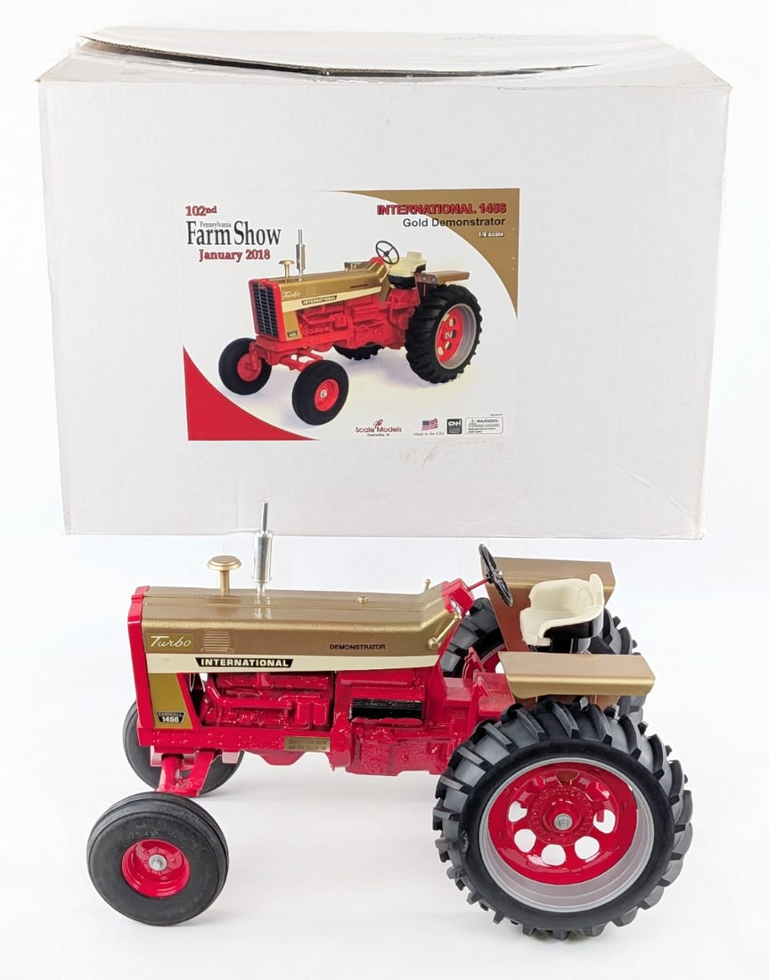 1/8 Scale Models International 1456 Golden Demonstrator Tractor: 1/8 Scale Models International 1456 Golden Demonstrator wide front tractor. 102nd Anniversary Pennsylvania Farm Show Edition January 2018. Good condition in the box with some light dust from display.