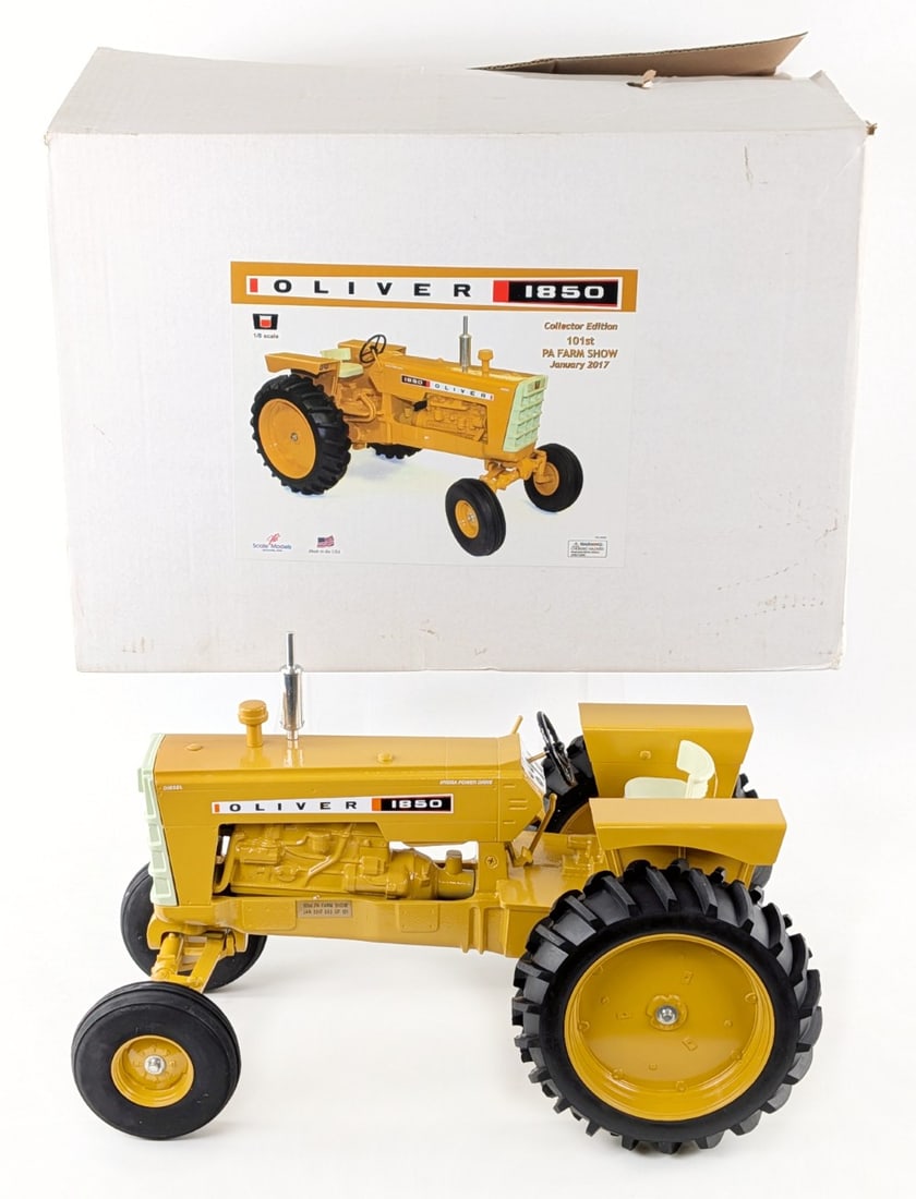 Industrial Yellow 1/8 Scale Models Oliver 1850 Wide Front Tractor: 1/8 Scale Models Industrial Yellow Oliver 1850 wide front tractor. 101st anniversary of the Pennsylvania Farm Show in January of 2017. Good condition new in the box.