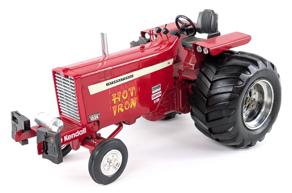 Custom 1/16 International Farmall 1206 "Hot Iron" Pulling Tractor: Custom 1/16 International Farmall 1206 Hot Iron pulling tractor. The tractor has custom tires, suitcase weights, levers, and chrome stack. Good condition and displays well with nice detail. It does ha