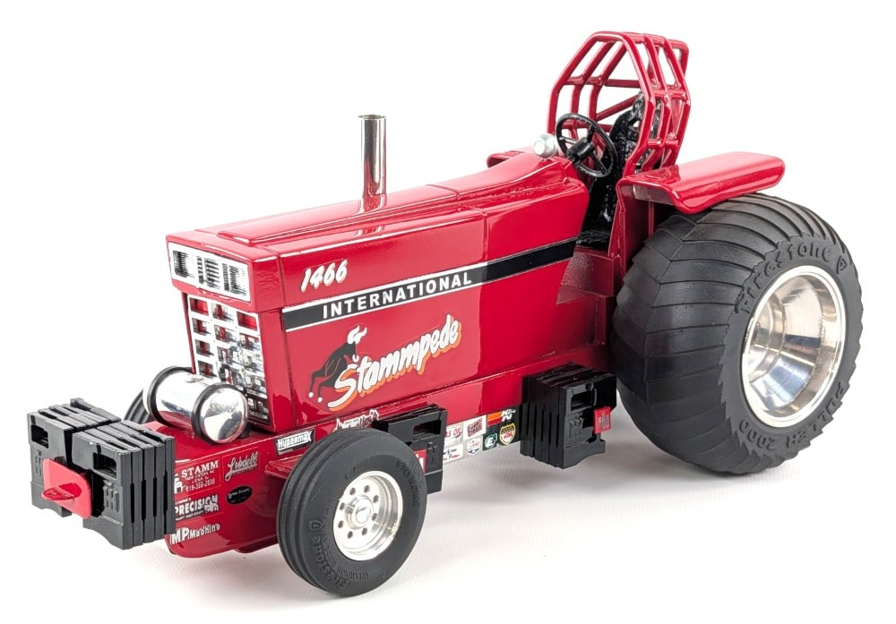 Custom 1/16 International 1466 "Stampede" Pulling Tractor: Custom 1/16 International 1466 "Stampede" pulling tractor. A very nice high quality custom pulling tractor. Displays well with suitcase weights, chrome features, custom tires, wheelie bar, roll cage,