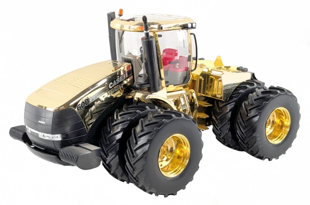 1/16 Ertl Case IH Steiger 600 4wd Tractor - Gold Chase Unit: 1/16 Ertl Case IH Steiger 600 4wd tractor. The tractor appears to be missing the mirrors. The gold chrome appears to have some discoloration, but still displays well overall. It has some light dust an