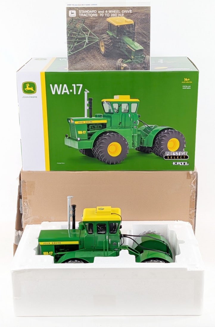 1/16 & 1/64 Ertl John Deere WA-17 4wd Tractor - Prestige Select Series: 1/16 & 1/64 Ertl John Deere WA-17 4wd tractor. Prestige Select Series. The 1/16 has a factory paint imperfection on the hood and some light dust from display. The 1/64 scale is included, but doesn't h