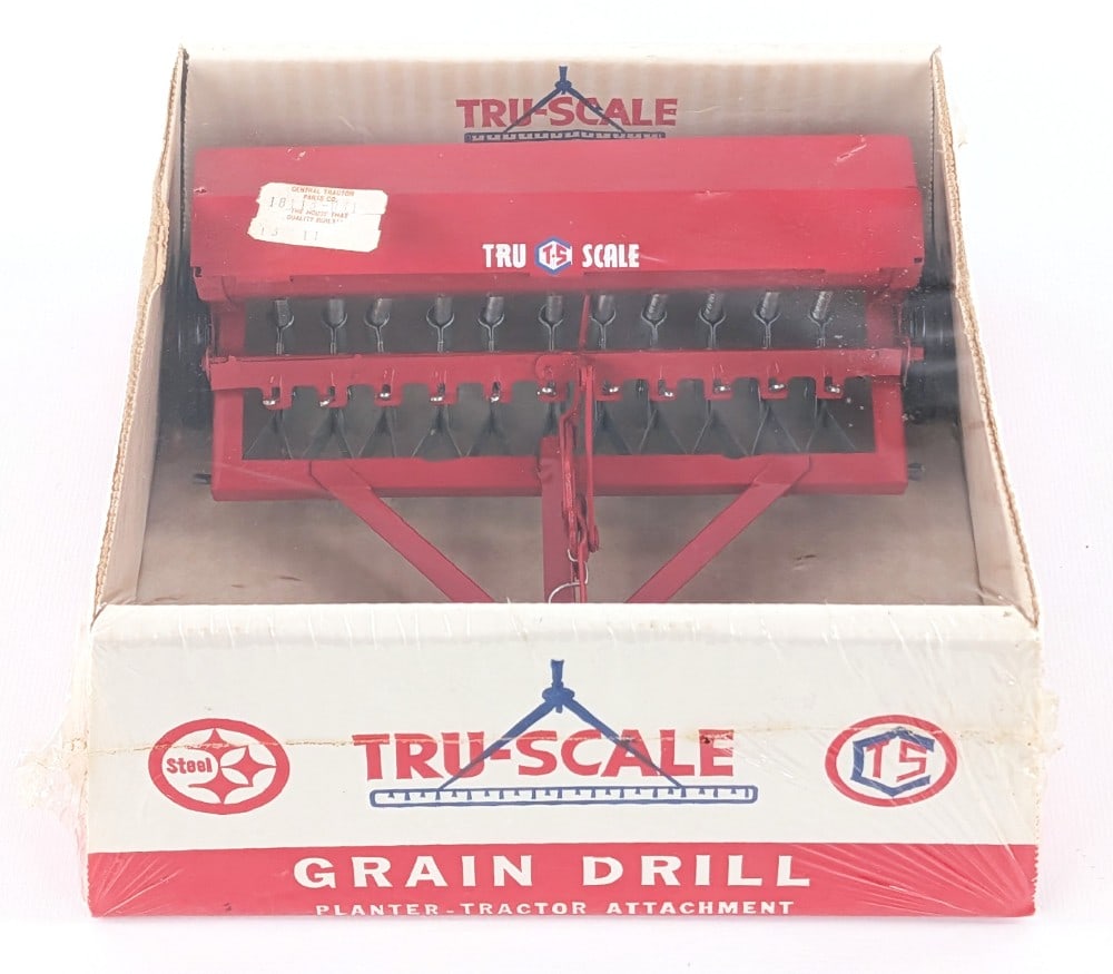 1/16 Tru-Scale 409 Grain Drill-Planter in Bubble Box - NIB: Vintage 1/16 Tru-Scale #409 grain drill-planter in the original bubble box. The planter is mint in the original box with the bubble all intact. It even has the original tag on the bubble. A very nice