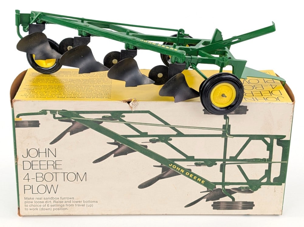 1/16 Ertl John Deere 4-Bottom Plow w/ Ice Cream box: Vintage 1/16 Ertl John Deere 4-bottom plow with ice cream box. The plow is overall in excellent condition with a couple tiny marks. The box is complete with all flaps intact and even has the cardboard