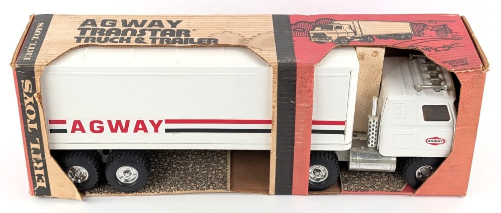 Ertl International Transtar Agway Truck & Trailer: Ertl International Transtar Agway truck and trailer in the original box. The box has water damage and wear from age / handling. The truck has some light wear from storage. Measures approximately 22" l