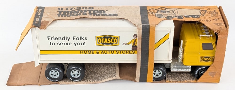 Ertl International Transtar Otasco Home & Auto Stores Truck & Trailer: Ertl International Transtar Otasco Home & Auto Stores semi truck and trailer. The truck has some discoloration to the plastic chrome pieces. The box is in farily rough condition with staining, water d