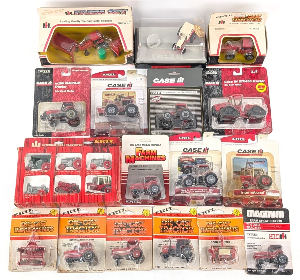 1/64 Ertl International Tractors & Implements In Packages: Includes 1/64 Ertl Stars & Stripes magnum 180, International 5088, STX450 quadtrac, International 983, planter, disk, farm set, IH 1066 5 mil tractor, and more. All of the packages have dust and wear