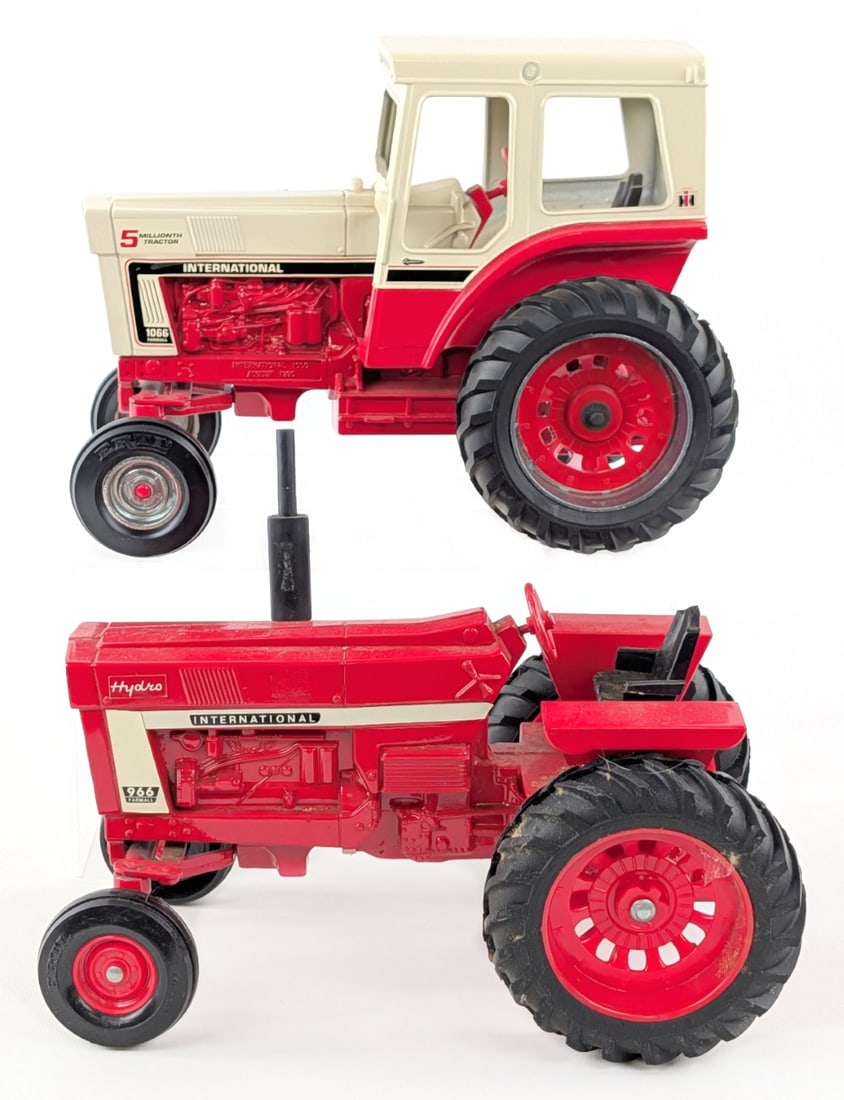 1/16 Ertl International 1066 5 Millionth Tractor and International 966 Tractor: 1/16 Ertl International 1066 5 millionth edition tractor with cab and International 966 wide front tractor with white stripe. The 1066 is missing the exhaust. Both have some dust and light wear from d