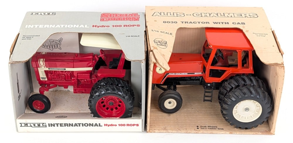 1/16 Ertl International Hydro 100 Tractor w/ ROPS and Allis-Chalmers 8030 Tractor w/ Duals: 1/16 Ertl International Hydro 100 tractor with ROPS and Allis-Chalmers 8030 tractor with duals. Both show some dust from storage. The box for the Allis-Chalmers has staining, creasing, and wear from h