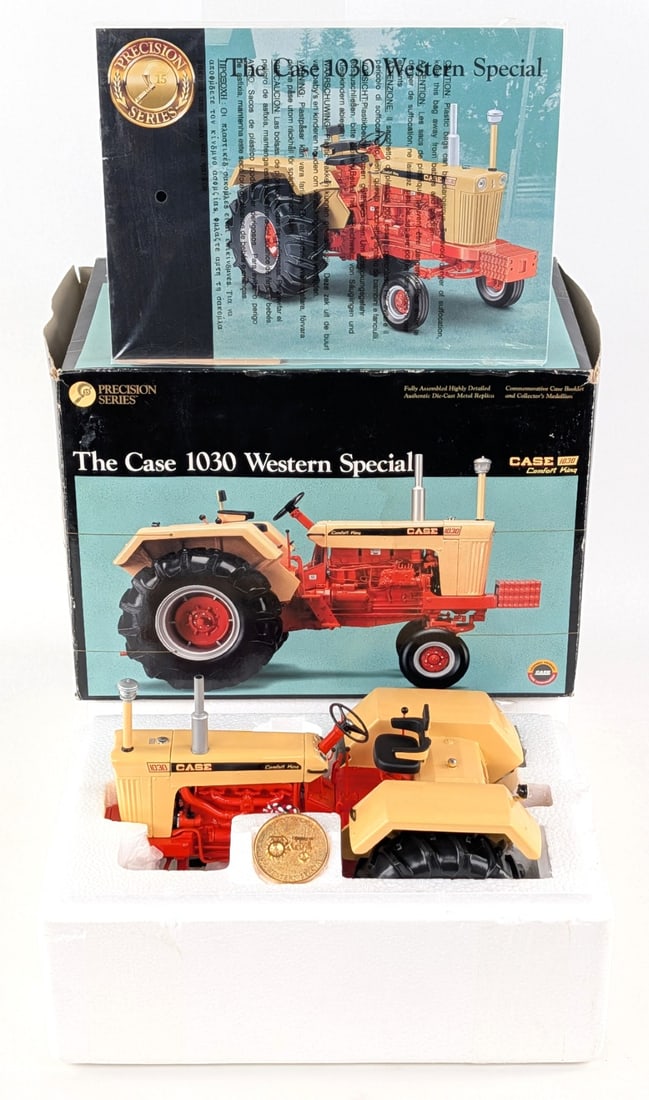 1/16 Ertl Precision Series Case 1030 Western Special Comfort King Tractor: 1/16 Ertl Precision Series #15 Case 1030 Western Special Comfort King tractor. The tractor has some dust from being on display. It comes with the booklet and collector's medallion. The box shows some