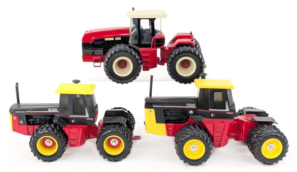 1/32 Versatile 2425, Versatile 836, and Versatile 1156 Tractors: 1/32 Ertl Versatile 2425 tractor, Scale Models Versatile 836, and Scale Models Versatile 1156 tractor. All have some dust and light wear from storage / display.