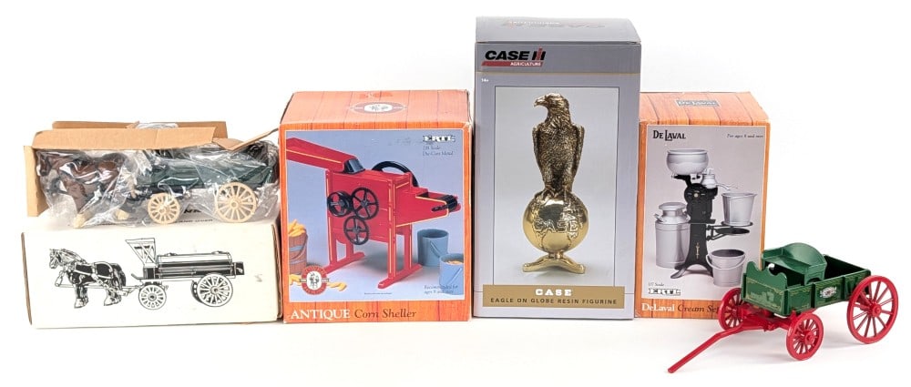 DeLaval Cream Separator Replica, Corn Sheller, Case Eagle, and More: Includes 1/7 scale DeLaval cream separator replica, 1/8 scale antique corn sheller replica, Ertl horse and wagon tanker bank, SpecCast gold Case Eagle globe statue, and Case buckboard wagon.