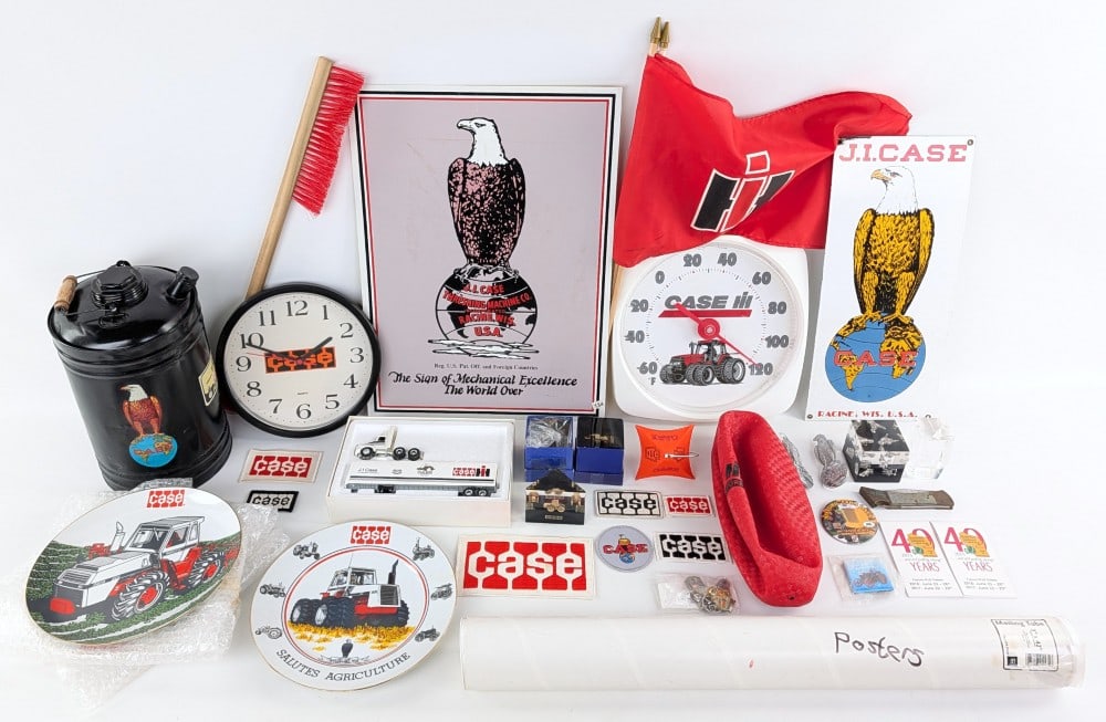 Large Lot of Case Memorabilia: Large lot of Case memorabilia. Includes porcelain sign, tin sign, patches, oil can, collector plates, poster, and more. The largest sign measures approximately 21" tall by 15" across.