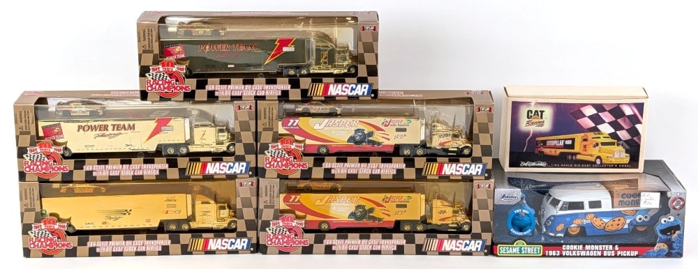 Gold 1/64 NASCAR Semi Trucks, Cookie Monster VW Van, and CAT Semi (1 of 8)