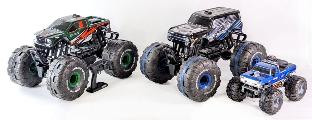 Ford F-150, Bronco, and Bigfoot RC Monster Trucks: Includes a large Ford F-150, Ford Bronco, and Bigfoot remote control monster trucks. Comes with only two remotes and all are untested. Largest measures 29" long.