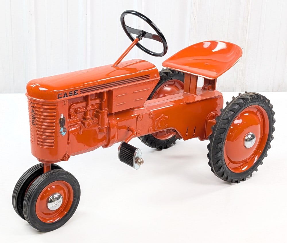 Restored Eska Case VAC Pedal Tractor: Restored Eska Case VAC pedal tractor. The tractor has a a nice restoration overall. It does have some tiny paint chips, decal loss, and some surface rust on the chrome hubcaps. Overall a nice hard to