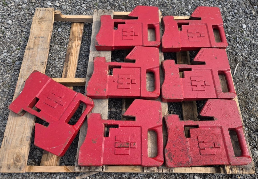 International Harvester Suitcase Weights: 7 matching suitcase weights Painted.