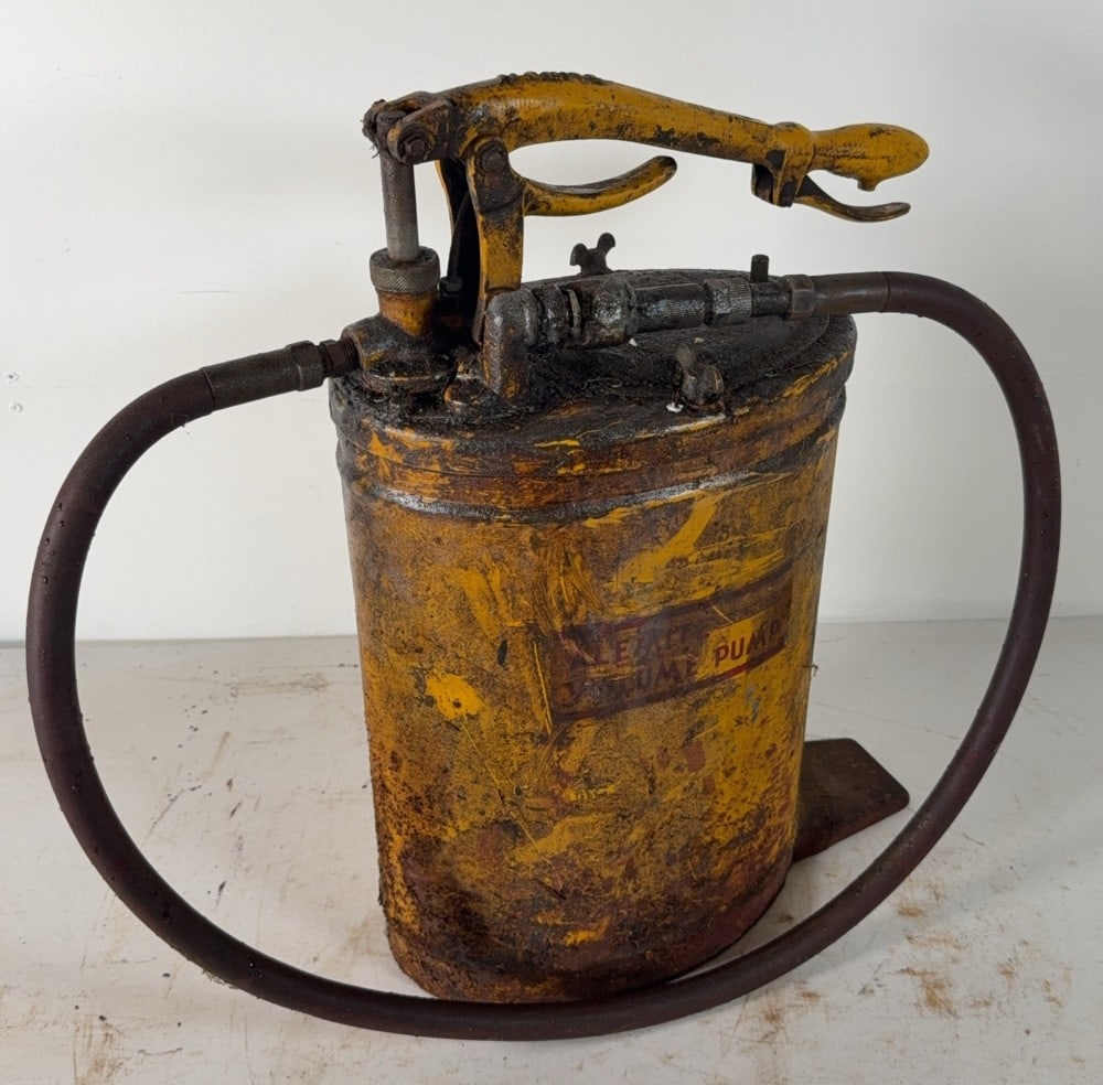 Alemite Tractor Volume Pump: All original, painted Caterpillar yellow