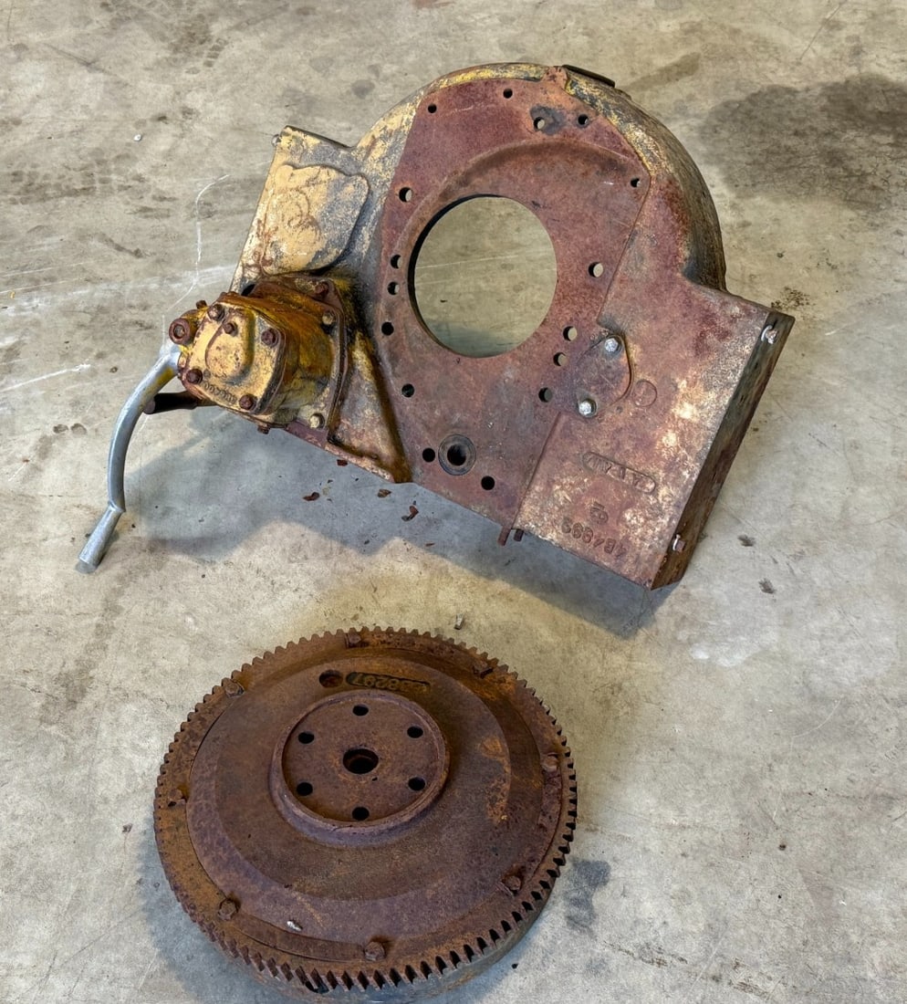 Caterpillar D2 Bell Housing and Flywheel: Pony Start D2 bell housing with Bendix, and D2 engine flywheel