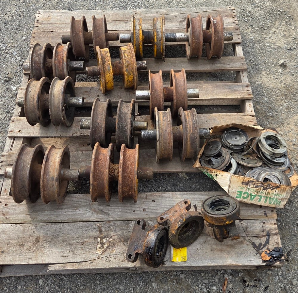 Caterpillar Track Rollers and Parts: 11 rollers and 3 holders