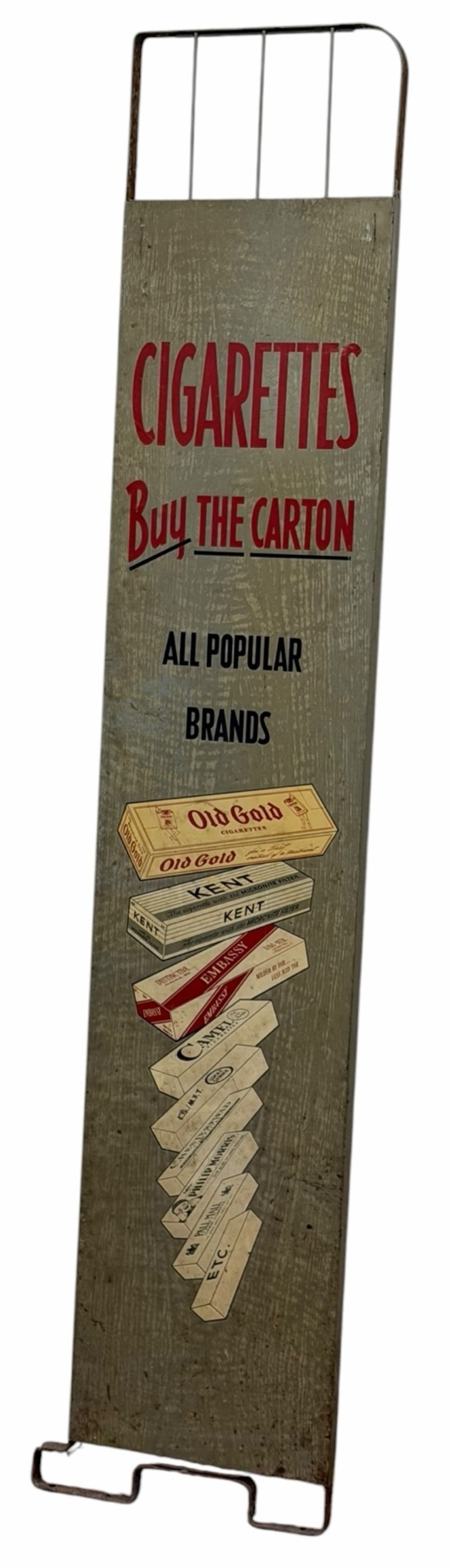 Vintage SS Tin "Cigarettes Buy The Carton" Rack End Cap: Vintage SS Tin "Cigarettes Buy The Carton" Rack End Cap.? The end piece is in overall nice condition with age and display wear.? Great graphics and measuring approximately 67.5in tall by 13in wide.