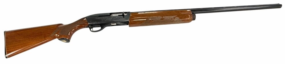 Remington Model 1100 .12 Ga Semi Automatic Shotgun: Remington Model 1100 .12 Ga Semi Automatic Shotgun.? The Remington model 1100 .12 Ga semi automatic shotgun is in nice used condition.? The vented barrel measures 30 inches in length.? Blueing is stro