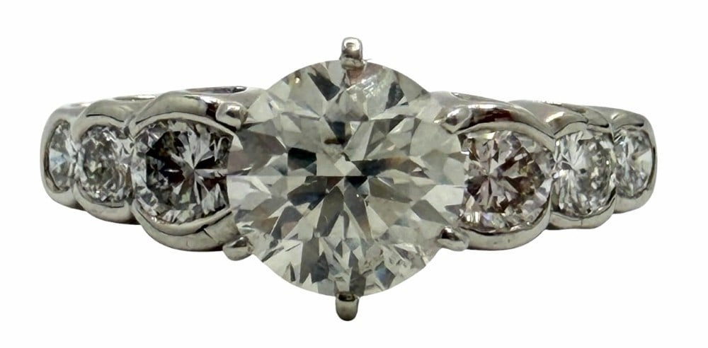 Platinum 1.43ctw Round Brilliant Cut Diamond Ring, Size 5: Platinum 1.43ctw Round Brilliant Cut Diamond Ring, Size 5.? This platinum round brilliant ring has a round brilliant cut diamond mounted in the center of the ring with a total weight of 1.03ct.? It ha