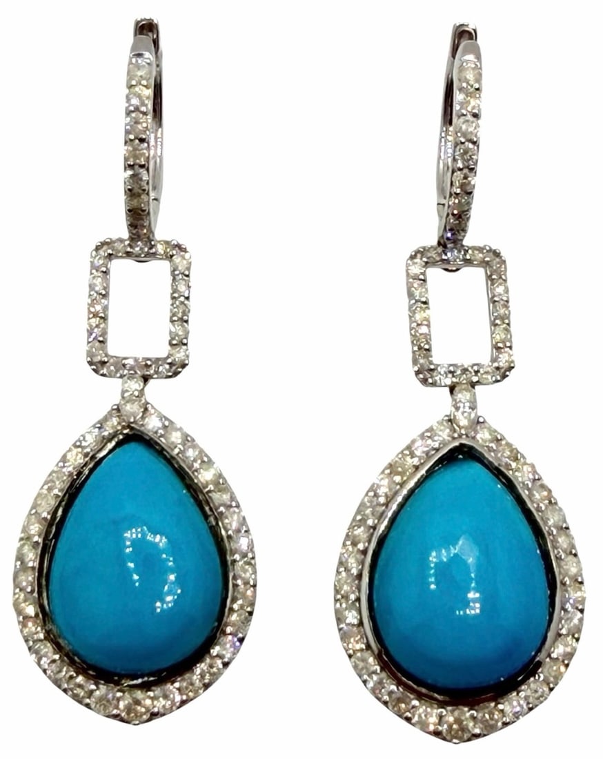 18K White Gold 12.95ctw Natural Turquoise and Diamond Earrings: 18K White Gold 12.95ctw Natural Turquoise and Diamond Earrings.? The two pear cabochon cut natural turquoise gemstones are mounted in teh center of the earrings and have a combined weight of 11.30ctw.