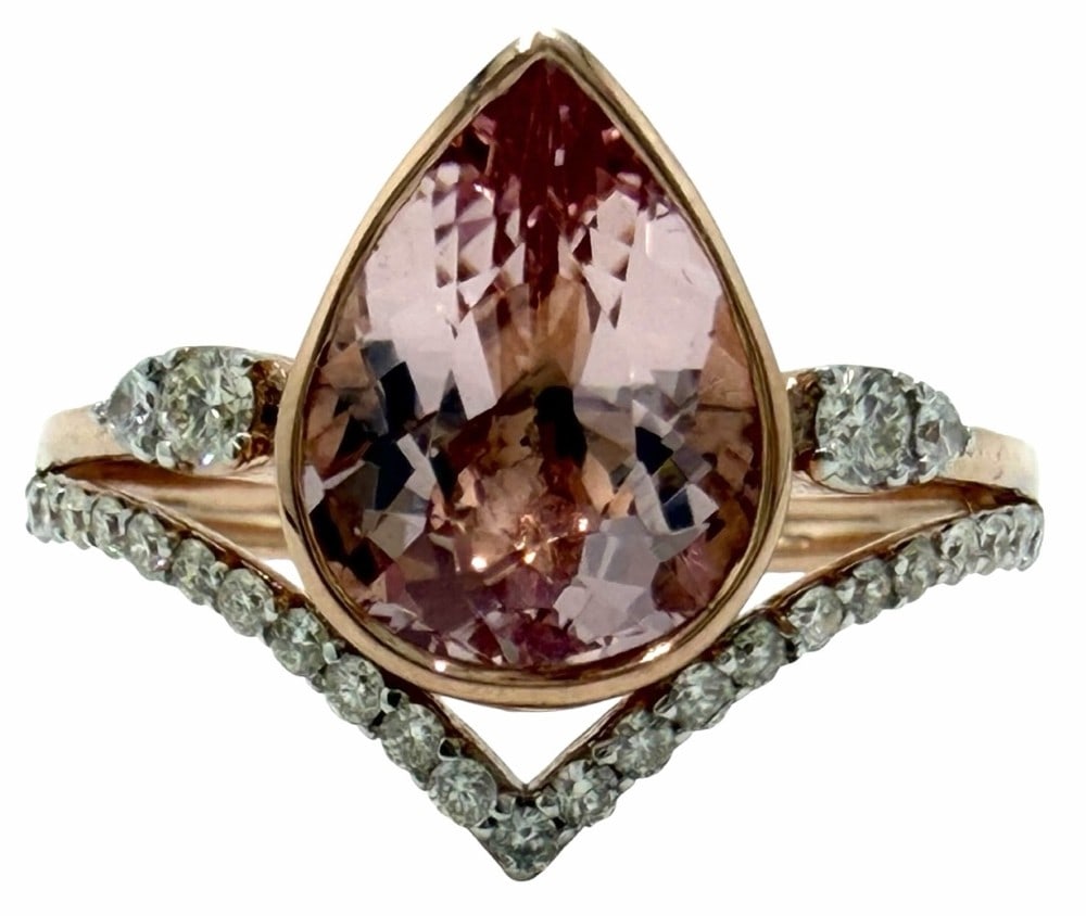 14K Two-Tone Gold 2.67ctw Natural Morganite Beryl and Diamond Ring, Size 7: 14K Two-Tone Gold 2.67ctw Natural Morganite Beryl and Diamond Ring, Size 7.? There is a pear brilliant cut natural morganite beryl gemstone mounted in the center of the ring and weighs 2.37ct.? A tota