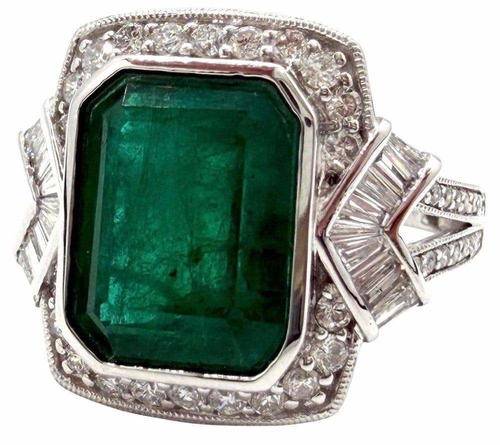 Platinum 8.32ctw Emerald and Diamond Ring, Size 6.5: Platinum 8.32ctw Emerald and Diamond Ring, Size 6.5.? This ring is polished, stamped, tested and marked Sheffield & Son's.? This beautiful ring is mounted with one genuine emerald center stone weighin