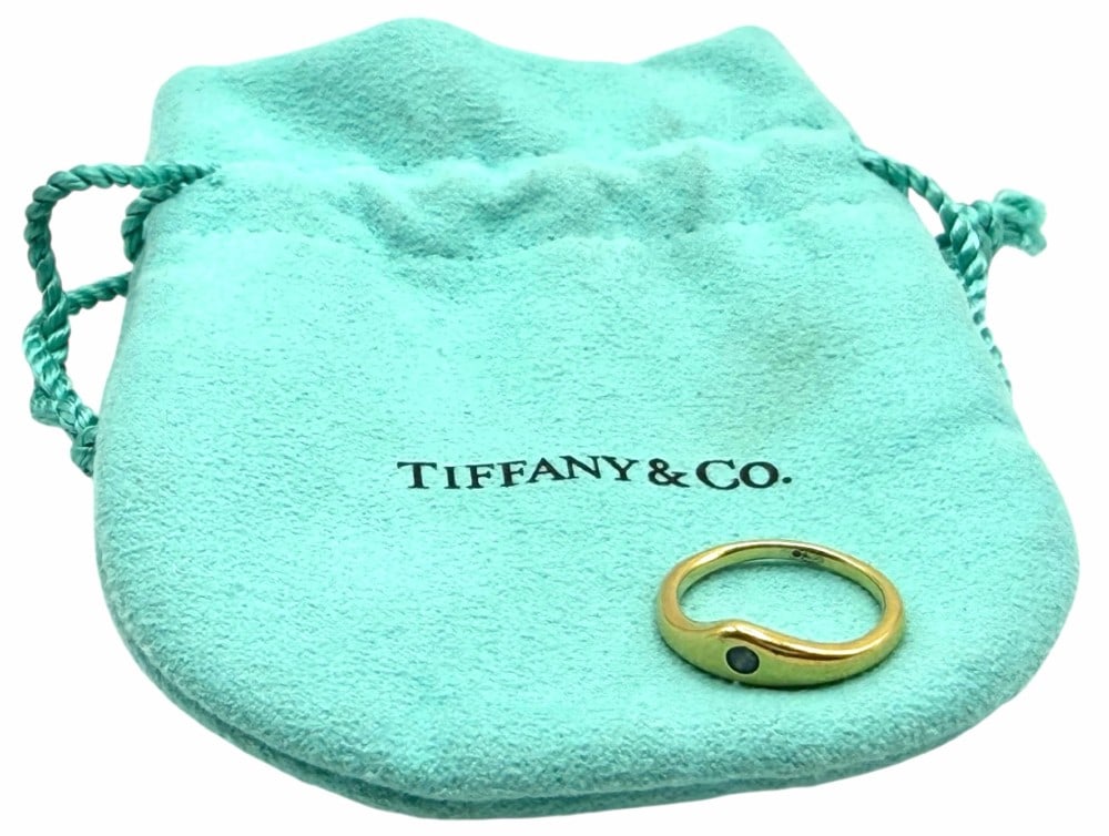Tiffany & Co. 18k Yellow Gold and Blue Sapphire Solitaire Ring: Tiffany & Co. 18k Yellow Gold and Blue Sapphire Solitaire Ring, Size 3.? Stamped T&Co. 750 on inner ring and has a total weight of 2.4g
