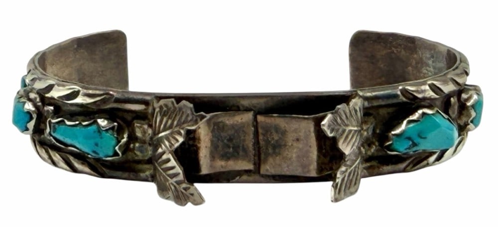 Wayne Calavaza Sterling Silver Native American Navajo Watch Cuff Bracelet: Wayne Calavaza Sterling Silver Native American Navajo Watch Cuff Bracelet. Engraved on the inside of the bracelet is WAYNE C. Has six turquoise stones along the side of it. Measures 2.5in x 2in x 0.5i
