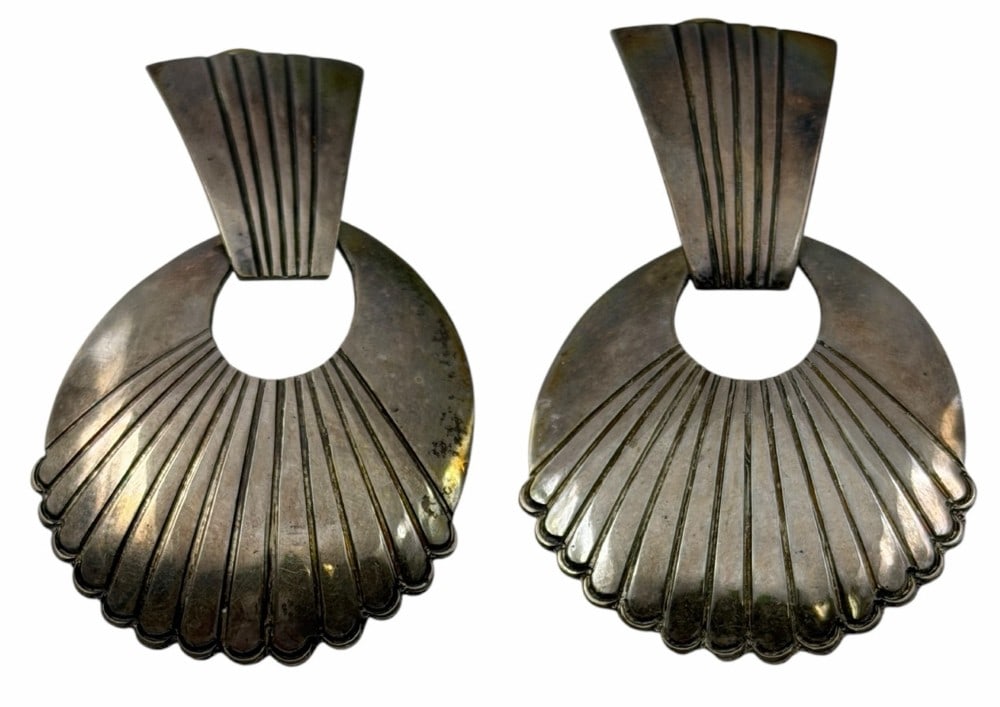 James Mason Sterling Silver Native American Scallop Shell Dangle Earrings: James Mason Sterling Silver Native American Scallop Shell Dangle Earrings. On the back of each of the earrings is JM & STERLING engraved. They each measure 2.25in x 1.25in and weigh 22.5 grams. They h