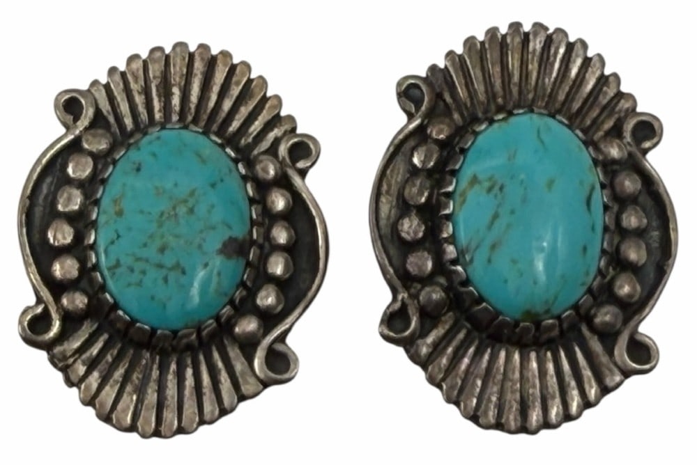 Angeline Miller Sterling Silver Native American Turquoise Clip-On Earrings: Angeline Miller Sterling Silver Native American Turquoise Clip-On Earrings. The back of the earrings have AM and STERLING engraved. They measure 1.25in x 0.75in and weigh 16.5 grams. They feature a be